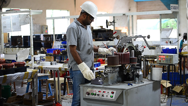 worker on machine at Narayan Powertech